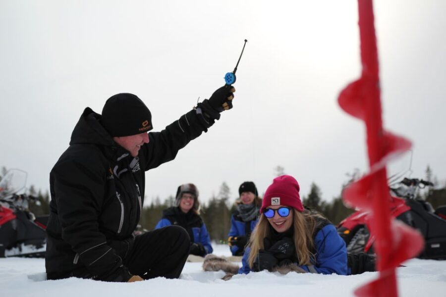 Rovaniemi: Snowmobile and Ice Fishing Adventure with Lunch - Ice Fishing in the Wilderness: Drilling the Hole and Learning the Rhythm