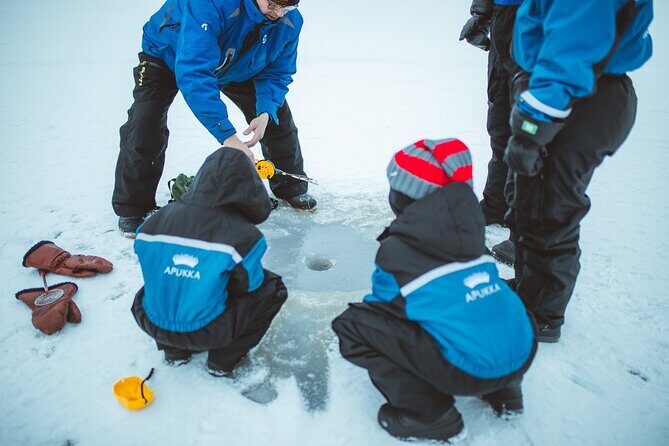 Snowmobiling and ice fishing in Apukka Resort, Rovaniemi - Ice Fishing on a Frozen Pond: What You Actually Try to Catch